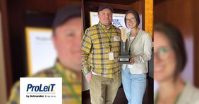 Witold Wilk und Alice Guzik von ProLeiT mit dem Supplier of the Year-Award